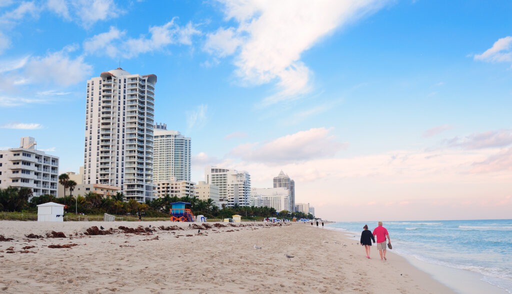 assisted living fort lauderdale seniors walking on beach